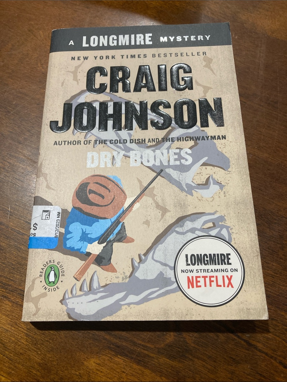 Craig Johnson Dry Bones Paperback Book - Beige/Cream Cover